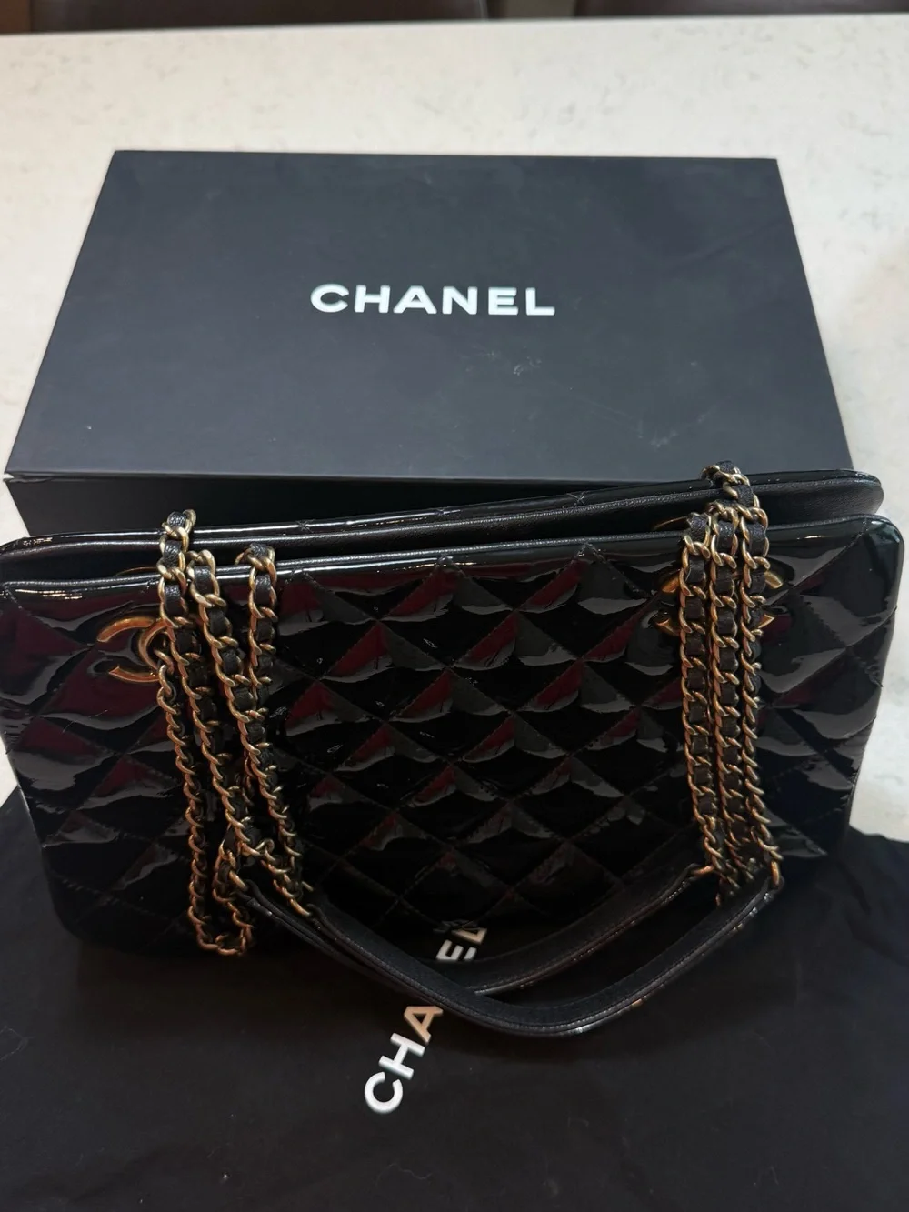 CHANEL Black Patent Quilted Shoulder Bag with Gold-Tone Chain